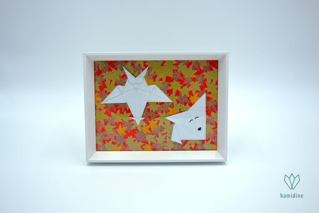 Cadre origami avec un renard et un hibou
