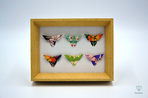Cadre papillons en papier origami de couleurs variées