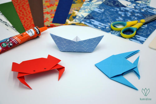 Un crabe, un bateau et un poisson en papier origami
